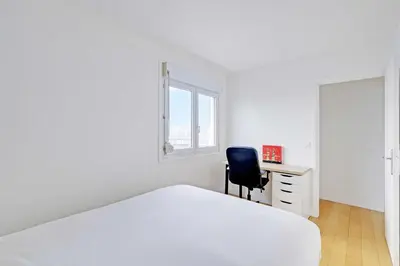 Un ou plusieurs lits dans un hébergement de l'établissement Charming Apartment 1BR 2P - Paris 12