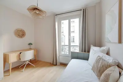 Un ou plusieurs lits dans un hébergement de l'établissement Luxury 3BDR 6P apartment - Neuilly-sur-Seine