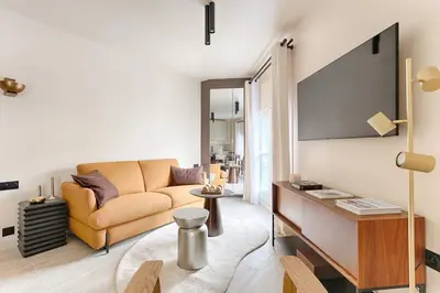 Télévision ou salle de divertissement dans l'établissement Sublime appartement Rue Royale