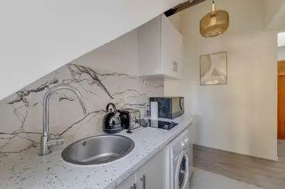 Cuisine ou kitchenette dans l'établissement Charming apartment - 2P- le Marais