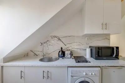 Cuisine ou kitchenette dans l'établissement Charming apartment - 2P- le Marais