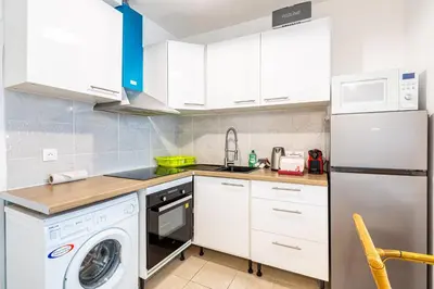 Cuisine ou kitchenette dans l'établissement GuestReady - Charming stay in Le Marais