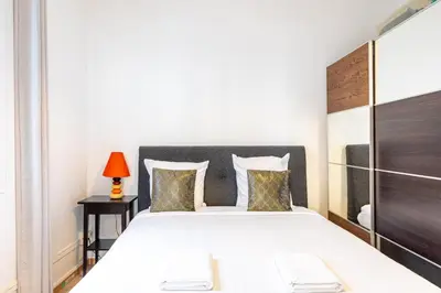 Un ou plusieurs lits dans un hébergement de l'établissement GuestReady - Charming stay in Le Marais