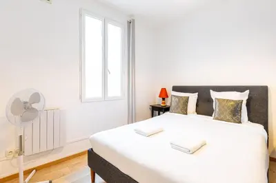 Un ou plusieurs lits dans un hébergement de l'établissement GuestReady - Charming stay in Le Marais