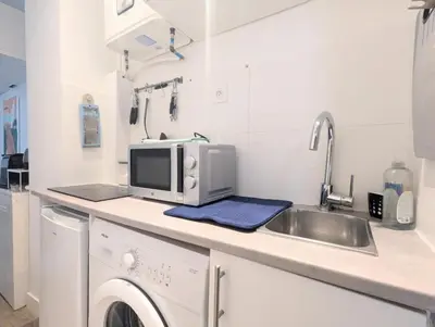 Cuisine ou kitchenette dans l'établissement Studio Montmartre cosy et central
