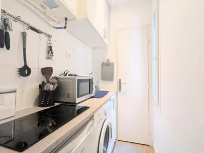 Cuisine ou kitchenette dans l'établissement Studio Montmartre cosy et central