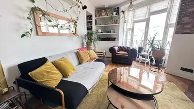 Coin salon dans l'établissement Cosy 1-Bedroom Apartment Near Montmartre