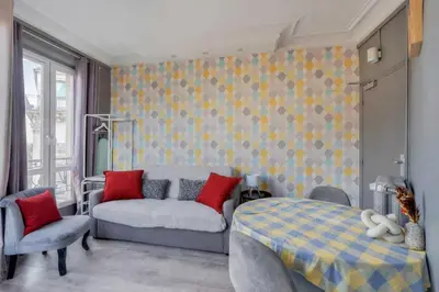 Un ou plusieurs lits dans un hébergement de l'établissement Comfortable Studio - 2P - Canal Saint-Martin