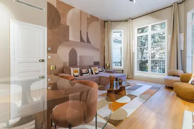 Coin salon dans l'établissement Élégant appartement climatisé in Arc de Triomphe