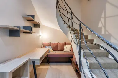 Coin salon dans l'établissement Prestigious 5BR Avenue Foch Home - Arc de Triomphe