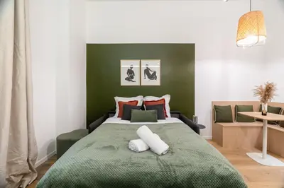 Un ou plusieurs lits dans un hébergement de l'établissement Charming Parisian studio