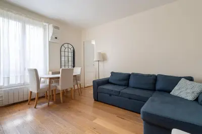 Coin salon dans l'établissement Elegant appartement avec ascenseur proche de la Tour Eiffel
