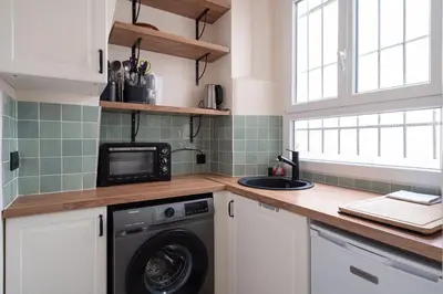 Cuisine ou kitchenette dans l'établissement Elegant appartement avec ascenseur proche de la Tour Eiffel