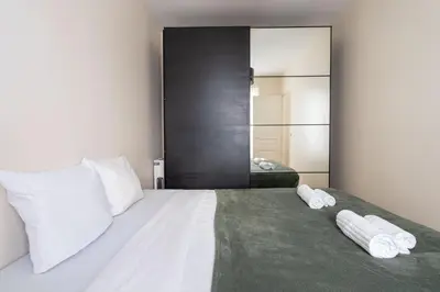 Un ou plusieurs lits dans un hébergement de l'établissement Elegant appartement avec ascenseur proche de la Tour Eiffel