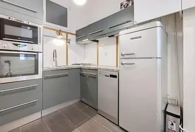 Cuisine ou kitchenette dans l'établissement Superbe Appartements Bourdonnais Tour Eiffel