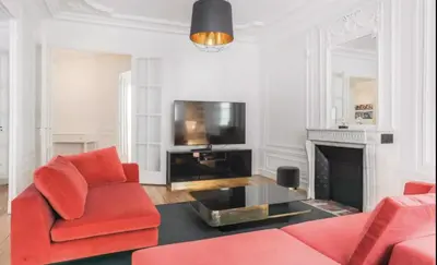 Télévision ou salle de divertissement dans l'établissement Superbe Appartements Louvre Richelieu