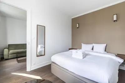 Un ou plusieurs lits dans un hébergement de l'établissement Place Leon Blum - Voltaire - 1 bedroom