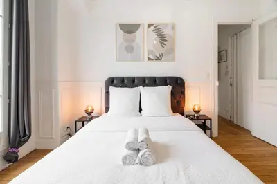 Un ou plusieurs lits dans un hébergement de l'établissement Elegant deux pieces - Paris 15e