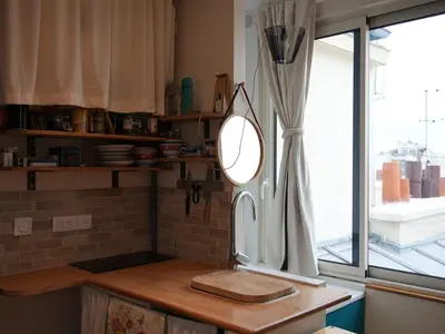 Cuisine ou kitchenette dans l'établissement Petit nid