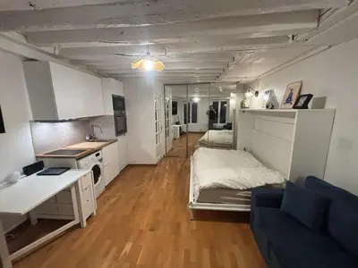 Un ou plusieurs lits dans un hébergement de l'établissement 4 person Studio in Paris 11eme