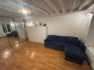Coin salon dans l'établissement 4 person Studio in Paris 11eme