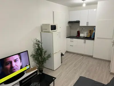 Cuisine ou kitchenette dans l'établissement New apartment HD video projector Home theater