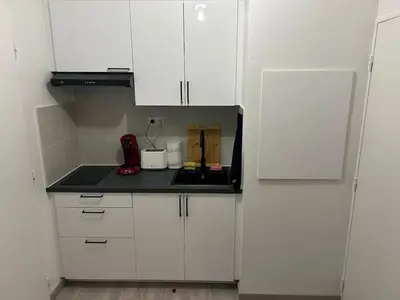 Cuisine ou kitchenette dans l'établissement New apartment HD video projector Home theater