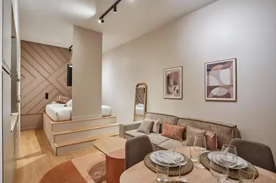 Coin salon dans l'établissement Spacious Apartment in the Heart of Paris near Notre-Dame