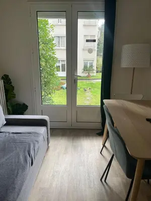 Coin salon dans l'établissement Appartement familial RDC