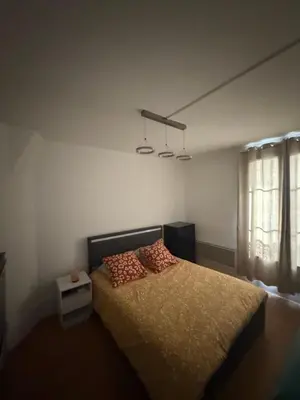 Un ou plusieurs lits dans un hébergement de l'établissement Cosy 2 pièces au calme - Paris 13e