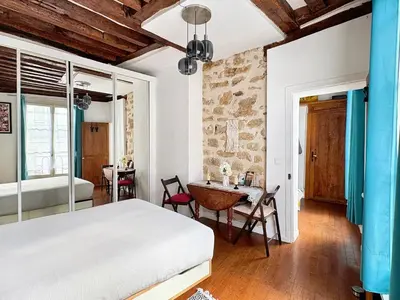 Un ou plusieurs lits dans un hébergement de l'établissement Un cosy studio near Notre Dame Paris 5