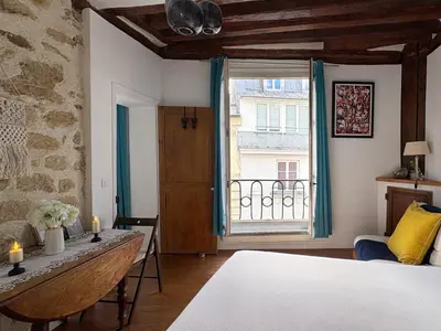 Un ou plusieurs lits dans un hébergement de l'établissement Un cosy studio near Notre Dame Paris 5
