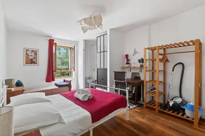 Un ou plusieurs lits dans un hébergement de l'établissement Premium 1BR flat with direct access to the RER B