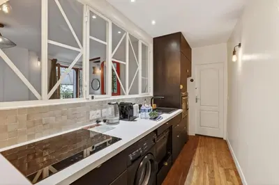 Cuisine ou kitchenette dans l'établissement Premium 1BR flat with direct access to the RER B
