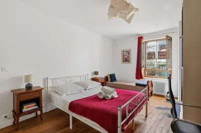Un ou plusieurs lits dans un hébergement de l'établissement Premium 1BR flat with direct access to the RER B