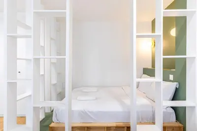 Un ou plusieurs lits dans un hébergement de l'établissement GuestReady - Parisian Charm near the Eiffel Tower