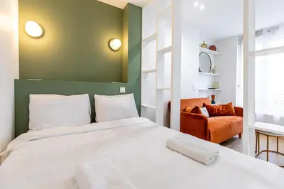 Un ou plusieurs lits dans un hébergement de l'établissement GuestReady - Parisian Charm near the Eiffel Tower