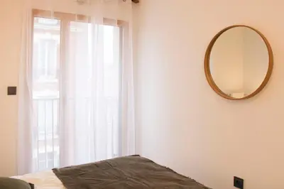 Un ou plusieurs lits dans un hébergement de l'établissement Appartement lumineux au cœur de Vanves