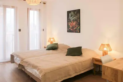 Un ou plusieurs lits dans un hébergement de l'établissement Appartement lumineux au cœur de Vanves