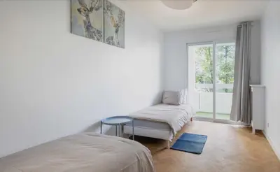 Un ou plusieurs lits dans un hébergement de l'établissement Superbe Appartements Tour Eiffel Grenelle