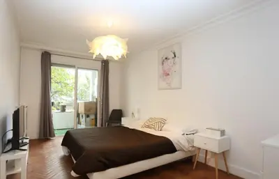 Un ou plusieurs lits dans un hébergement de l'établissement Superbe Appartements Tour Eiffel Grenelle