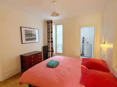 Un ou plusieurs lits dans un hébergement de l'établissement Large 4-room apartment in Paris 5th Cuvier