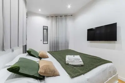 Un ou plusieurs lits dans un hébergement de l'établissement Appartement lumineux vaugirard a Paris 15 - 4P