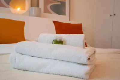 Un ou plusieurs lits dans un hébergement de l'établissement Studio neuf Paris 3eme Metro Etienne Marcel