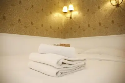 Un ou plusieurs lits dans un hébergement de l'établissement Magnifique appartement familial grand boulevard-6P