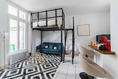 Coin salon dans l'établissement Grand Studio cosy Gare de reuilly - Paris 12 - 4p