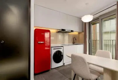 Cuisine ou kitchenette dans l'établissement Studio Premium Moderne avec Balcon - Parc des Expositions