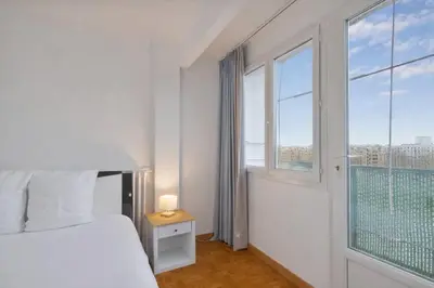 Un ou plusieurs lits dans un hébergement de l'établissement Lumineux 3 CH - 8 P - Zenith & La Villette