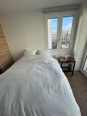 Un ou plusieurs lits dans un hébergement de l'établissement Newly renovated apartment in Neuilly-sur-Seine