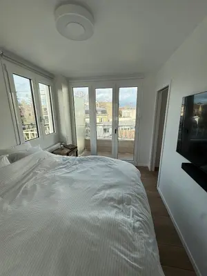 Un ou plusieurs lits dans un hébergement de l'établissement Newly renovated apartment in Neuilly-sur-Seine